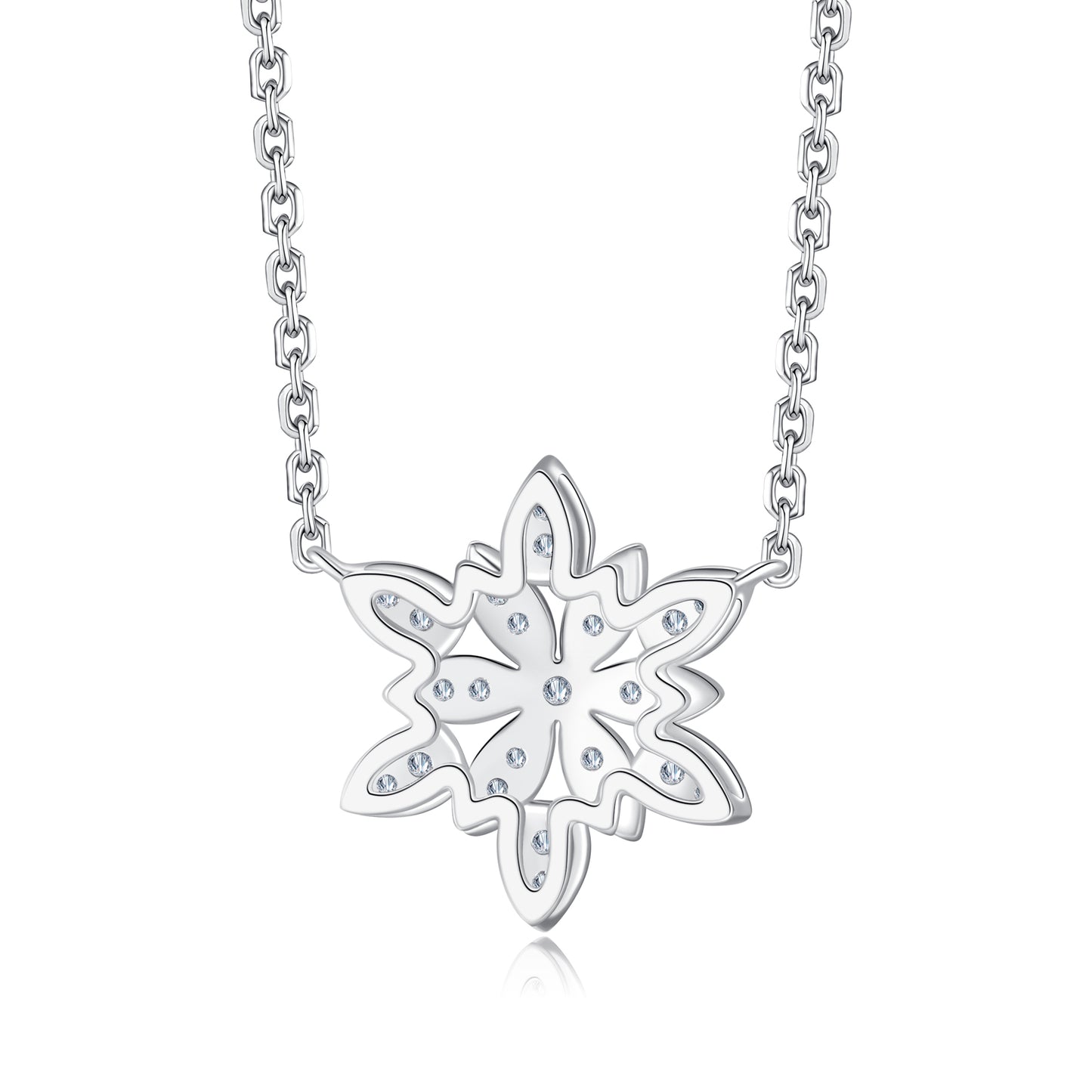 Conjunto de collar, pendientes y anillo en oro blanco de 18 quilates inspirado en las formas y movimientos de los copos de nieve.